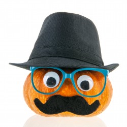 Funny pumpkin with face and hat