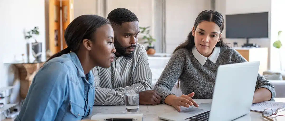 Couple looking over a financial advisor marketing strategy.