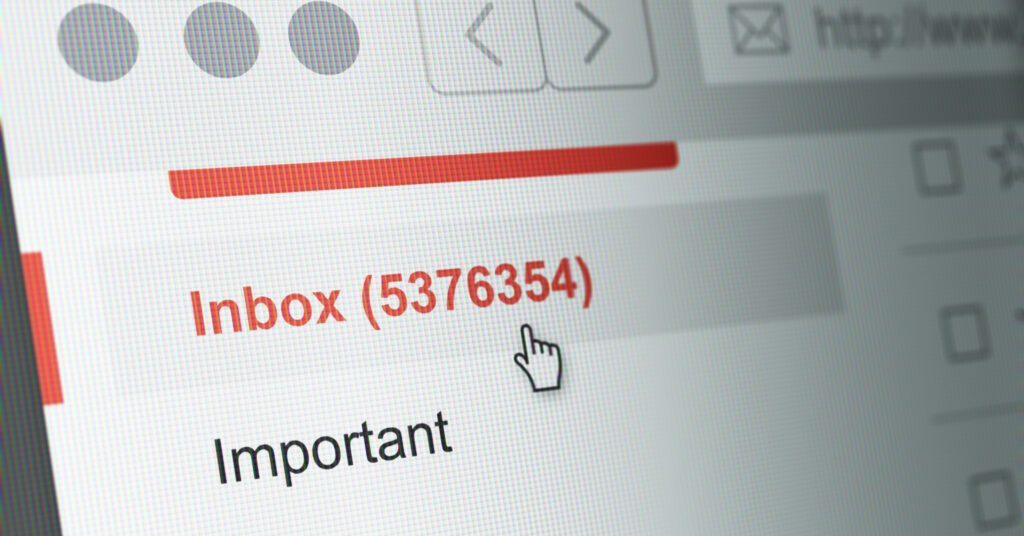 Computer monitor shows an extremely full inbox to illustrate the concept of inbox placement