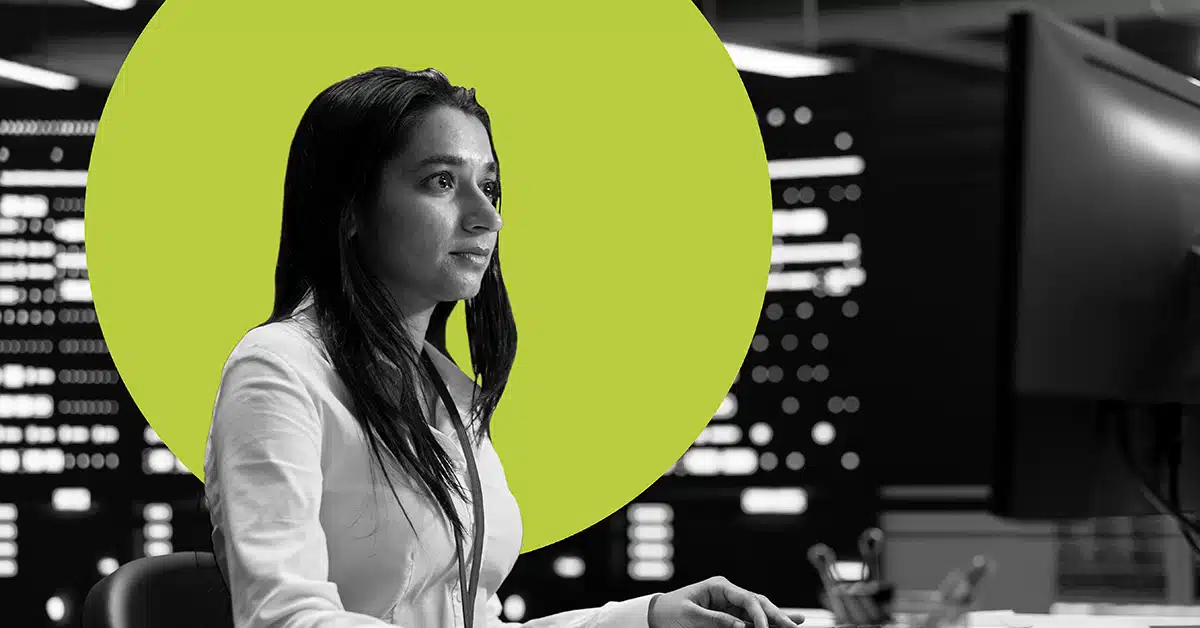 a woman works in an office at night