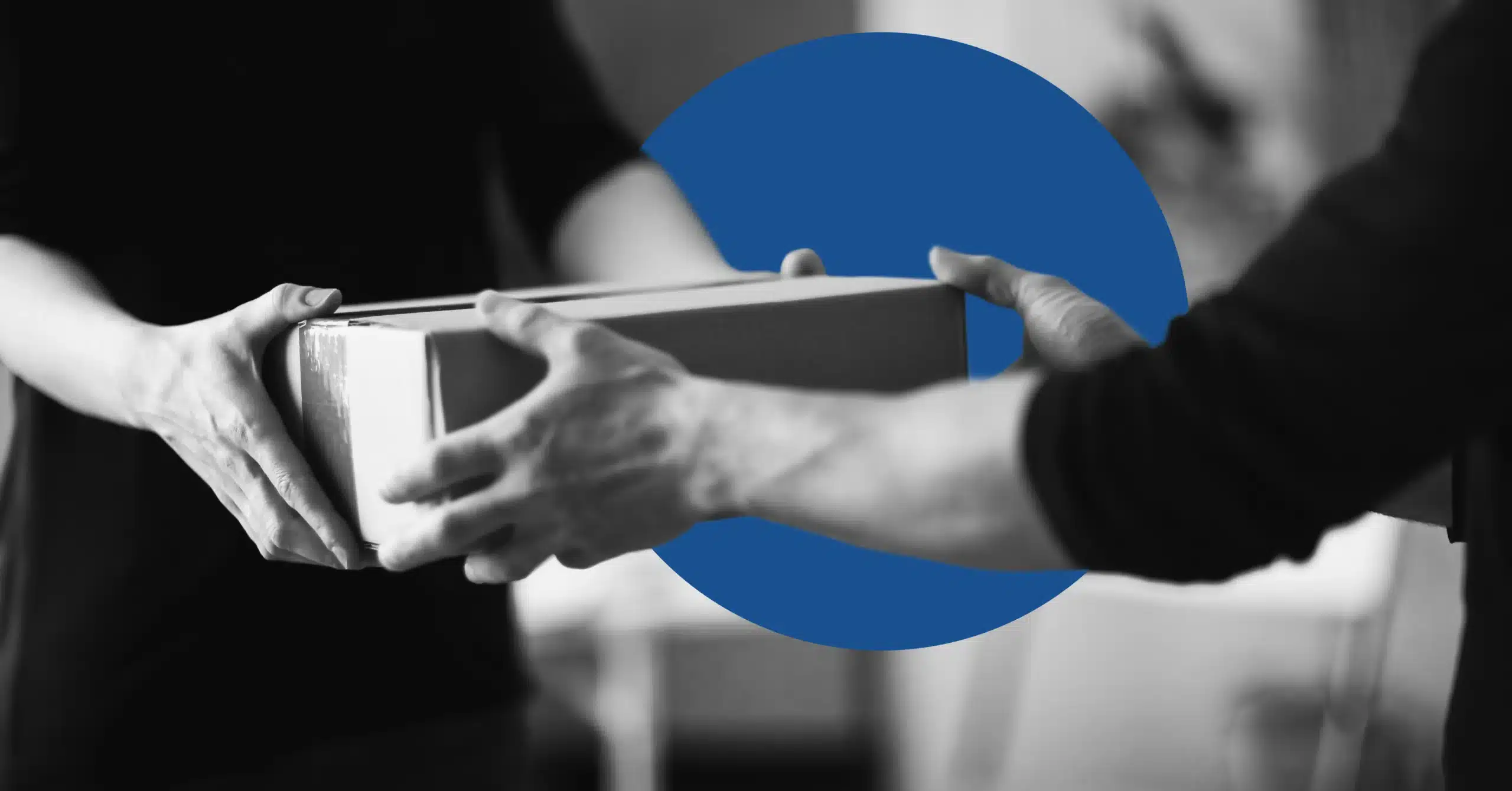 a package changes hands in black and white to illustrate the idea of deliverability in email